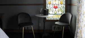 view of stained glass and side table