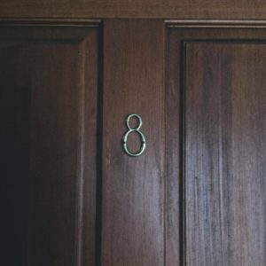 close-up of door with room number eight